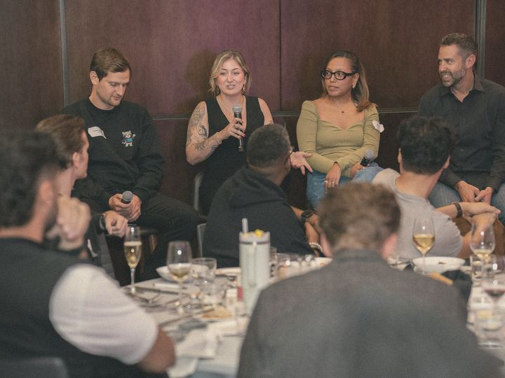 A panel conversation at a business dinner