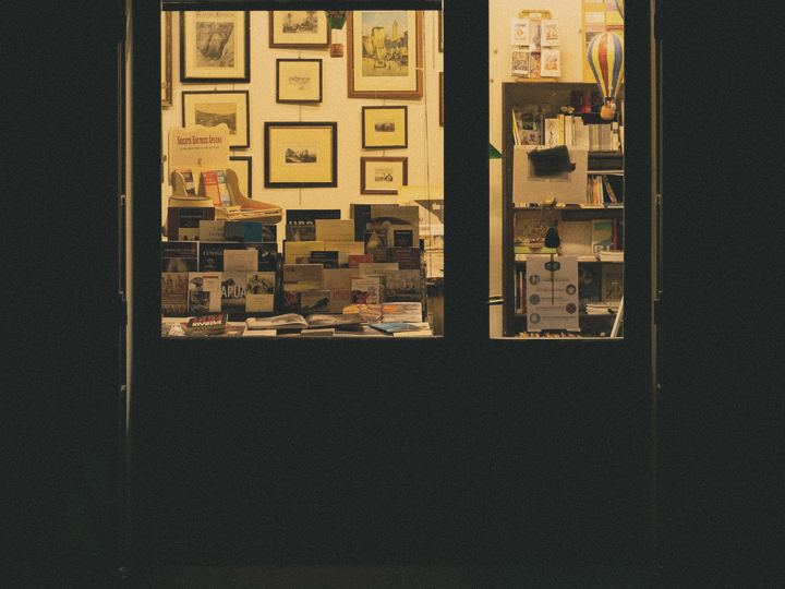 A shop window glowing late at night